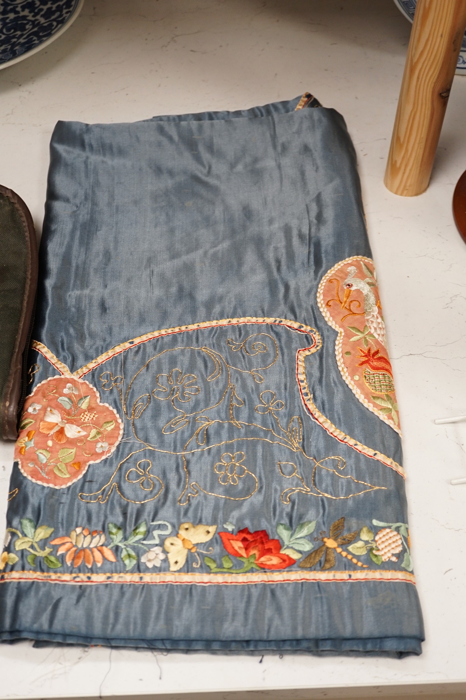 Three Chinese embroideries, including a Buddhist hanging